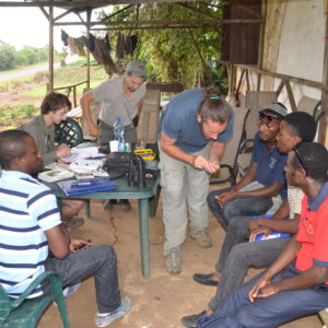 Jared demonstrating the banding grip to Equatoguinean university students (Photo by Luke Powell/BI)